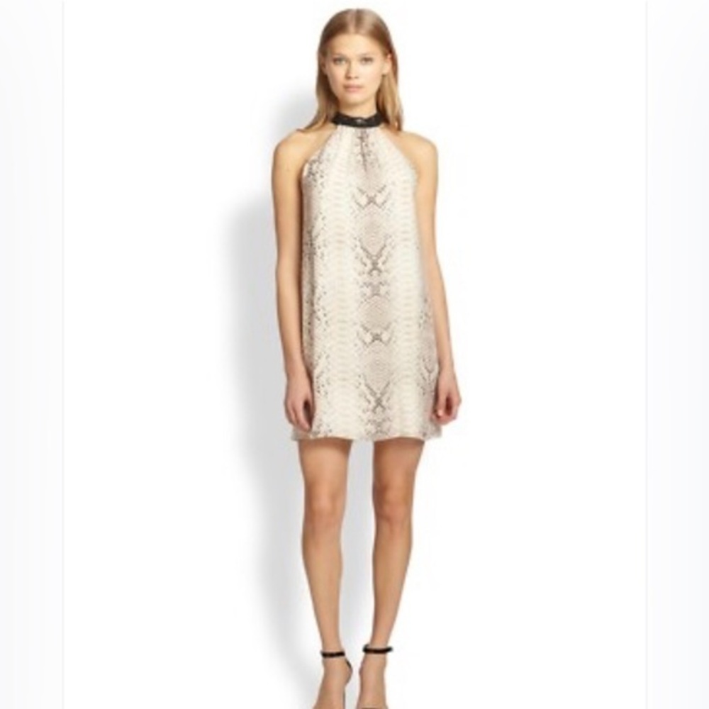 Haute Hippi Sleeveless snakeskin
Choker Mini Dress. Fully lined size small .